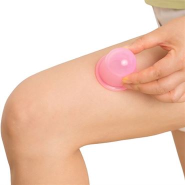 Uniq cupping massage suction cup xl, pink - against orange skin