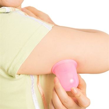 Uniq cupping massage suction cup xl, pink - against orange skin
